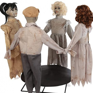 doll children dressed as ghosts