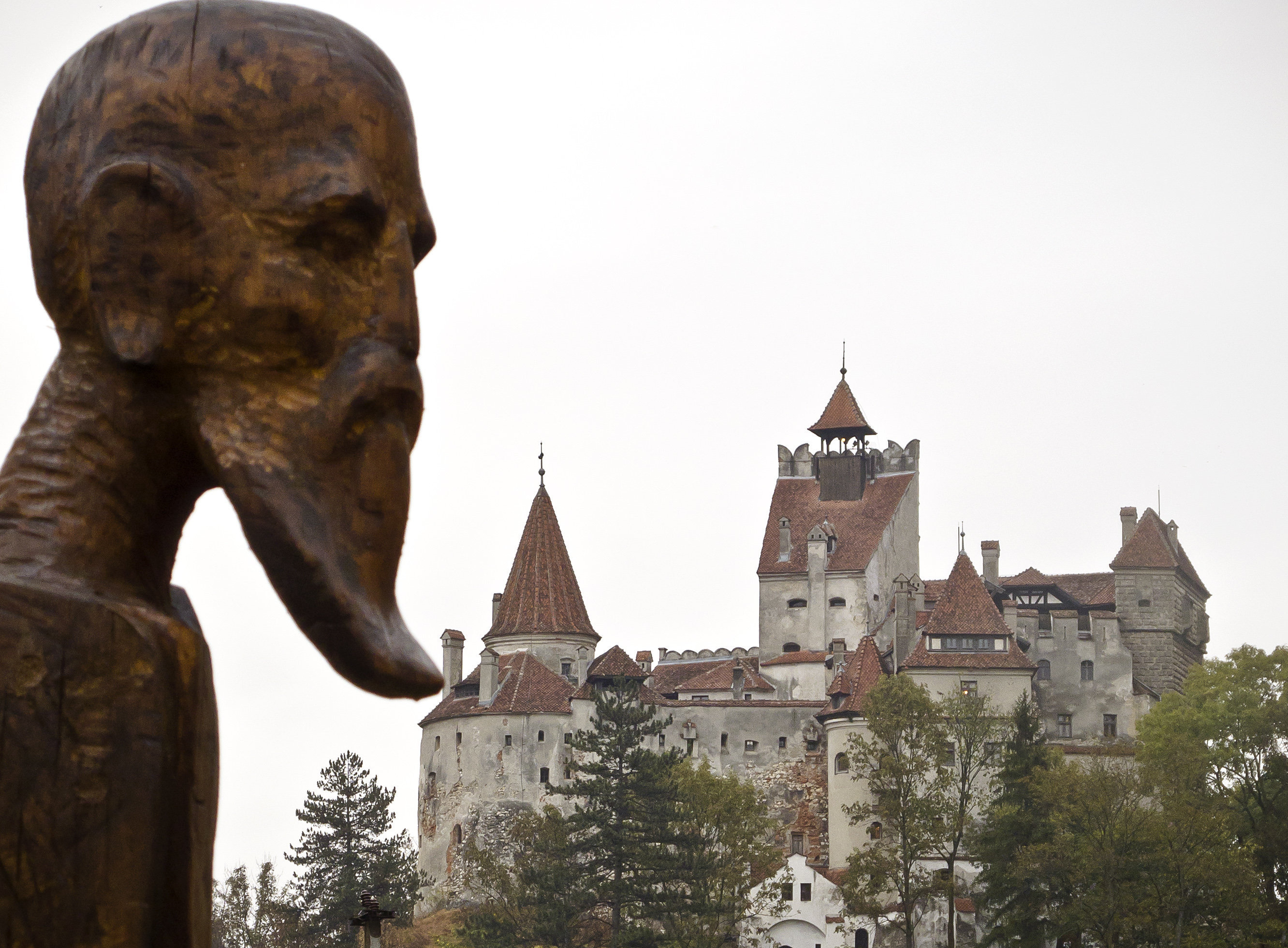 Even the good guys look spooky at this creepy castle. Shown here: Romanian priest Petru Darascu.