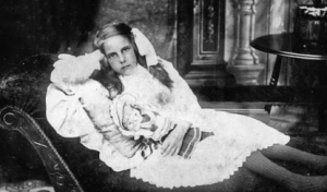 deceased girl reclining on couch