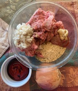 meatloaf ingredients are placed in a bowl